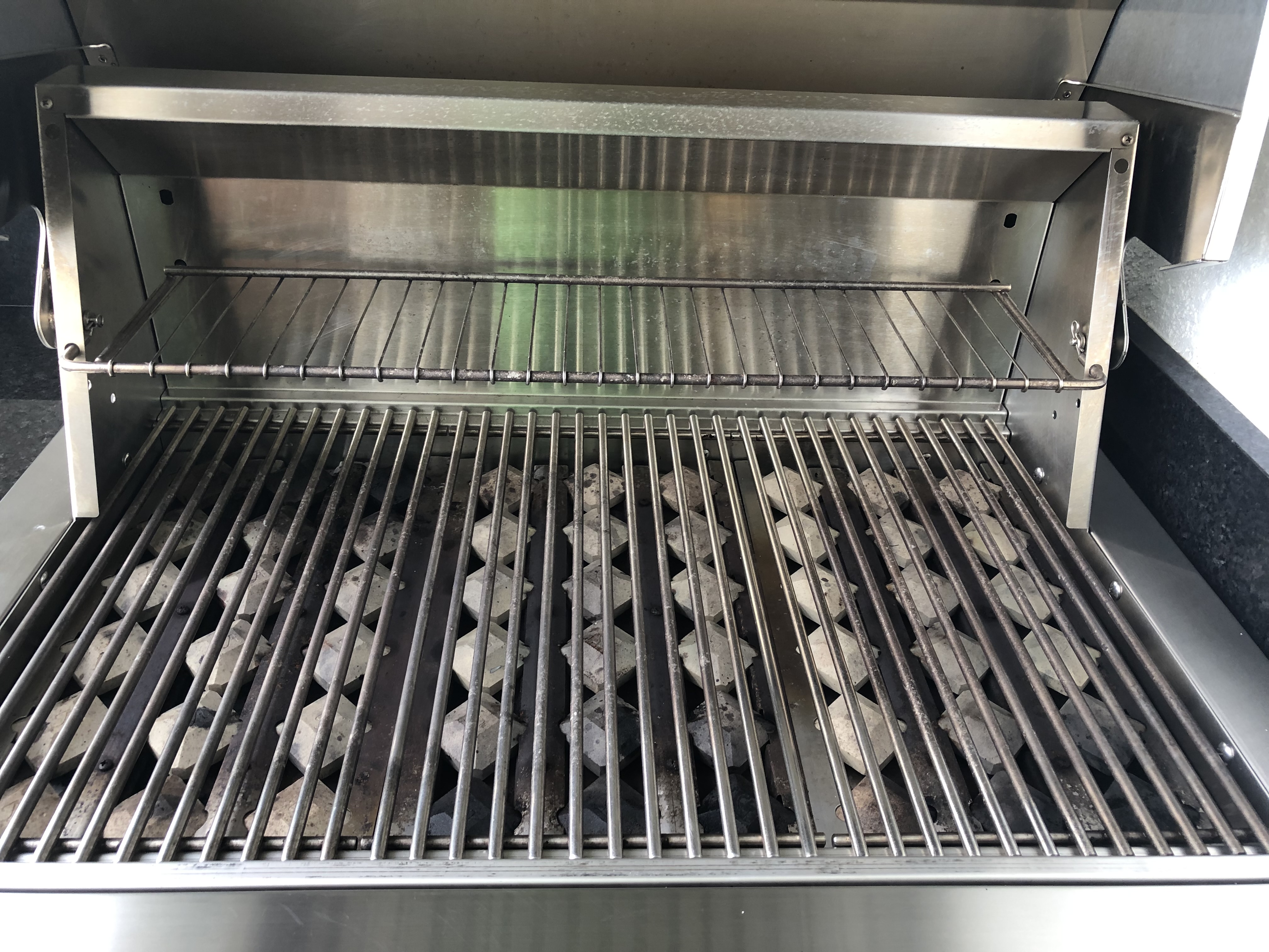 Clean BBQ grill by Delmy's Home Services